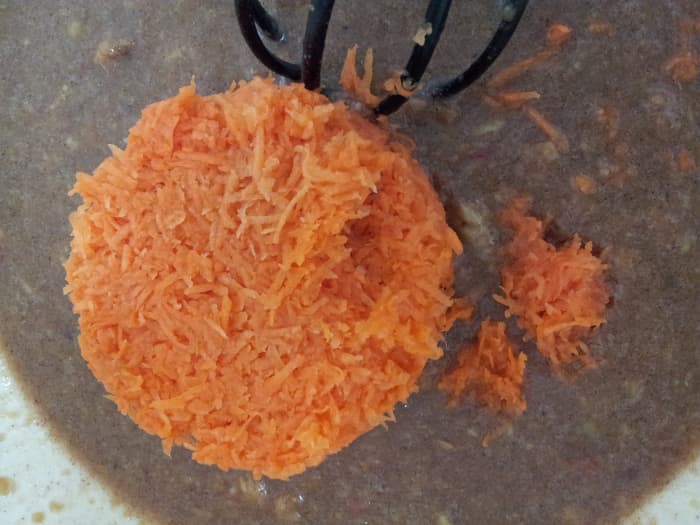 Stirring in the carrots is likely easier than whisking (that usually results in a clump of stuff in the whisk). Isn't that bright orange a beautiful addition? Eat your colours!