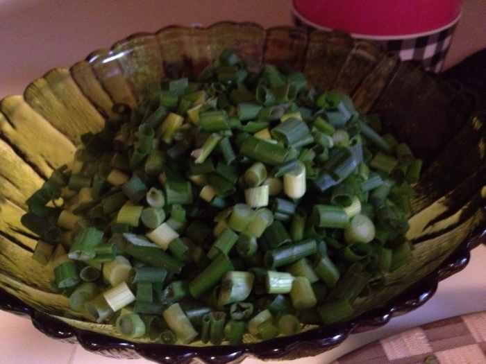 Green onions in a bowl (do not saute these)