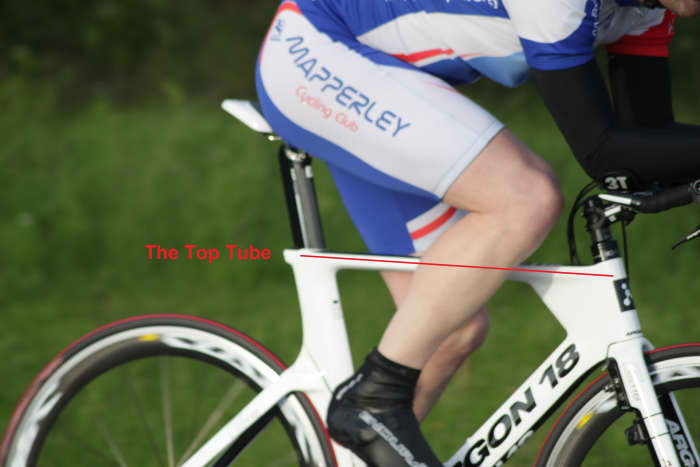 The top tube of a bicycle frame- connects the seat tube to the head tube. Bicycle featured is an Argon 18 E-118 Time Trial Frame with Mavic Cosmic Carbone Wheelset