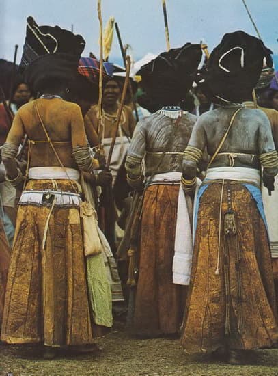 Thembu women(Of the Xhosa People) wore highly decorated leather purses hanging from the hip over leather skirts.Circa 1960