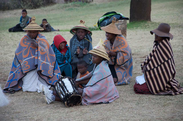 Baotho people coveed in their traditional blanet and waring their customary traditional hats-The dress so because they live in the Maluti(Mountains of Drakensberg where it is very cold