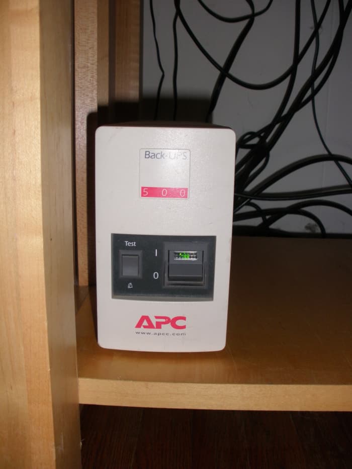 My ancient APC Back-UPS 500, that lives beneath the TV stand and quietly stands by to provide power to my Hopper with Sling DVR and my internet gateway (modem + router).