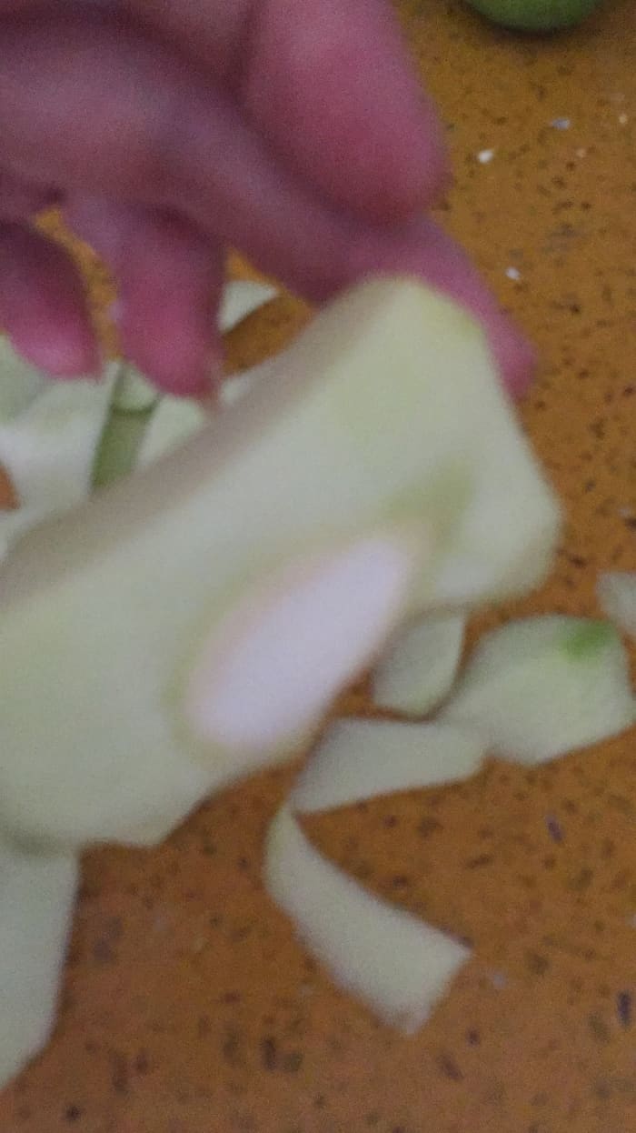 What the middle of the green mango will look like when you are peeling it. Make sure that you fully remove the mango seed. It will be colored white like the picture, once peeled it is easy to remove the seed.