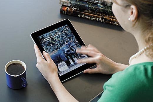 Kevin Kelly worries devices like Apple's iPad, shown here with Smithsonian's first cover, nurtures action over contemplation.