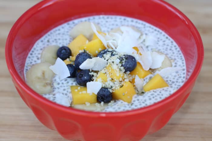 Chia seed tapioca pudding with COCONUT MILK, mangp, bananas, coconut flakes, blueberries.
