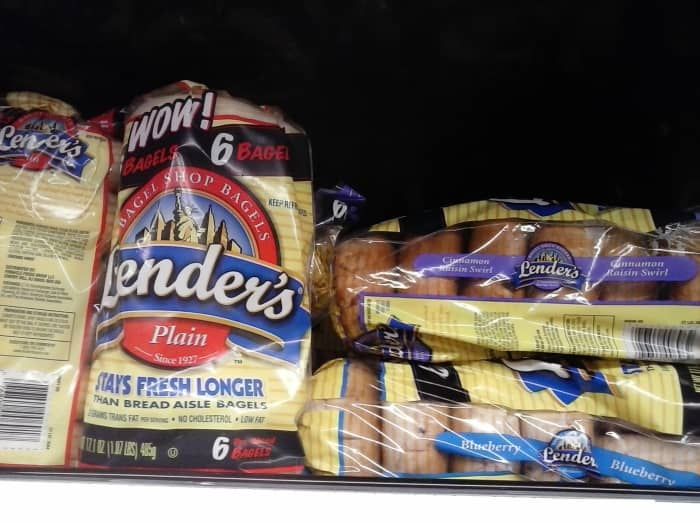 Most bagel brands of any flavor are higher in calories and carbs than wheat breads. This company has 40 carbs per bagel and 210 calories for most flavors.