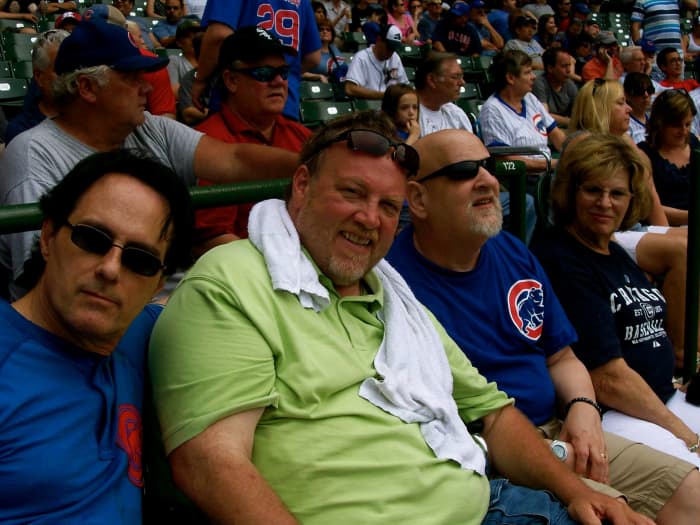 Jim Watkins, Dale Parsons (personal manager of the White Summer band), Jimmy Schrader and his wife Barbara Schrader at Wrigley Field (2013)