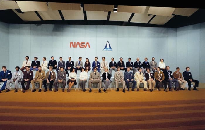 The "35 New Guys" of NASA. Dick Scobee appears in a commanding position front and center, in between pioneering women Sally Ride and Rhea Seddon.