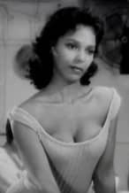 Dorothy Dandridge with a round or heart-shaped face--it's hard to tell--made even more heart-shaped by the fluffing out at her neck.