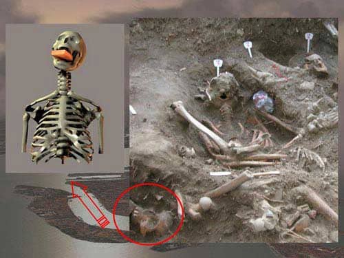 Vampire Bones or at least people thought they were. Notice the brick shoved in the female vampires mouth.