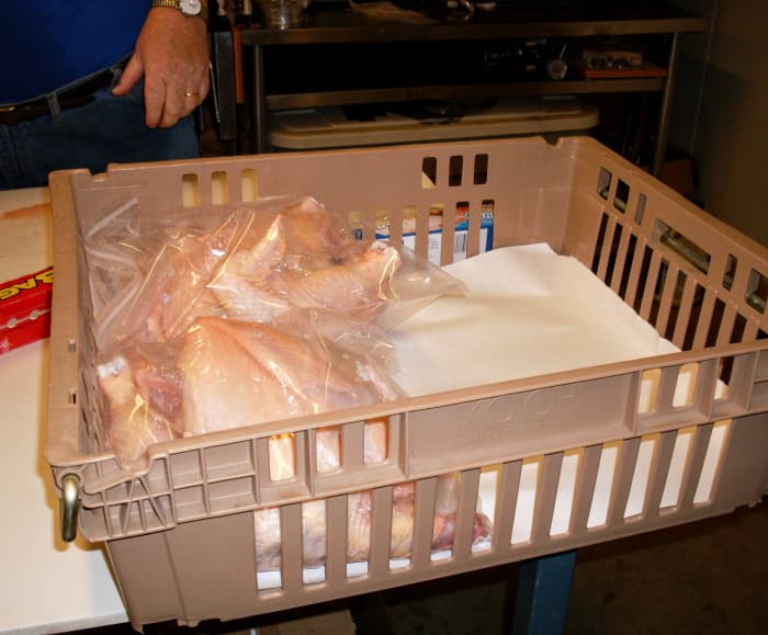 Get them frozen as quickly as possible. We placed ours in easy-stack baskets in a walk-in freezer. In a home freezer, space them out at first, overnight, in the bottom if possible.