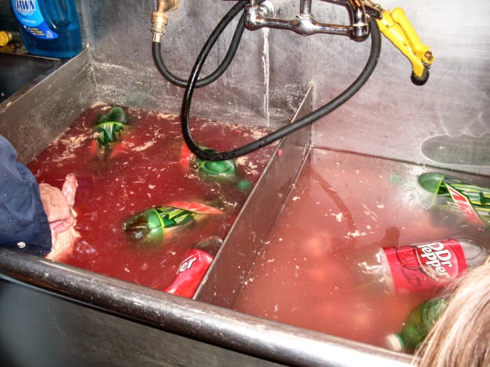 The water will get bloody. Don't bother to change it unless it gets too dark to find chicken pieces easily.