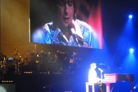 A very cool part of the show where he sings a duet with himself (on the large screen) the spotlight was so bright, he looks almost "angelic" in this picture.
