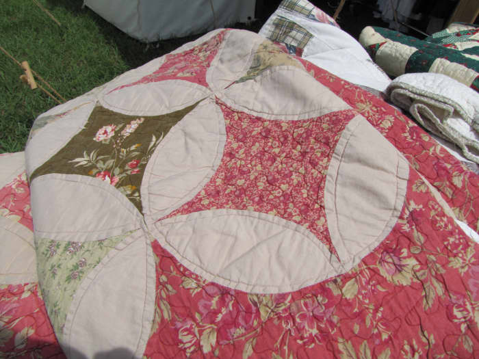 It is unlikely that a soldier would carry a heavy quilt along on the march. More likely a quilt such as this would have been used while the troops were in winter camp.