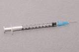 A typical syringe for the local anaesthetic. I didn't see the syringe for the nerve-root process. I suspect it may b slightly longer.