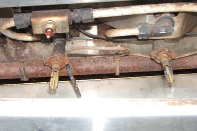 20 year old DCS control valves from a gas grill recently repaired. while this doesn't look beautiful most barbecues purchased 20 years ago would be dead several times over. this grill is still in use and with $1000. of parts and service will last a