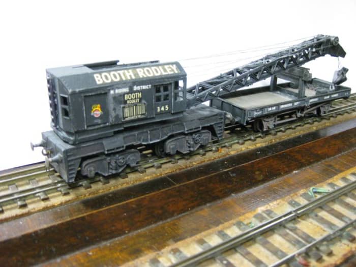 This is my version of the Dapol (formerly Airfix) kit above modelled in early BR livery, picture taken during DOGA meeting at Keen House HQ of the Model Railway Club. My own crane runner is a modified Parkside Plate Wagon