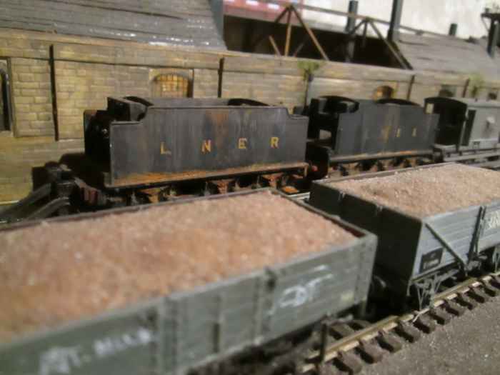 Sand wagons at Ayton Lane mpd with a couple of LNER Group Standard tenders behind in use as slurry tanks - engines may have been written off after bombing in WWII - one from a Bachmann J39 loco, the other etched brass kit-built bought separately
