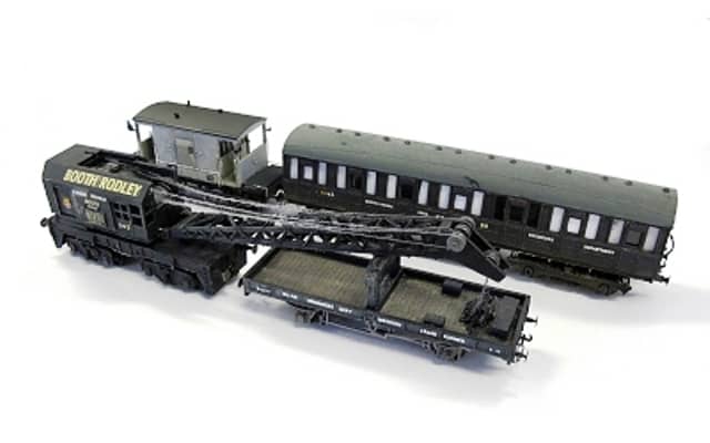 The 'Crane Train', at the back Airfix/Dapol brake van modelled as 'un-fitted' to the left of a modified Ian Kirk kit-built coach (part of a Quad set). Front left is an Airfix/Dapol bogie mounted crane with crane runner, modified Parkside plate wagon
