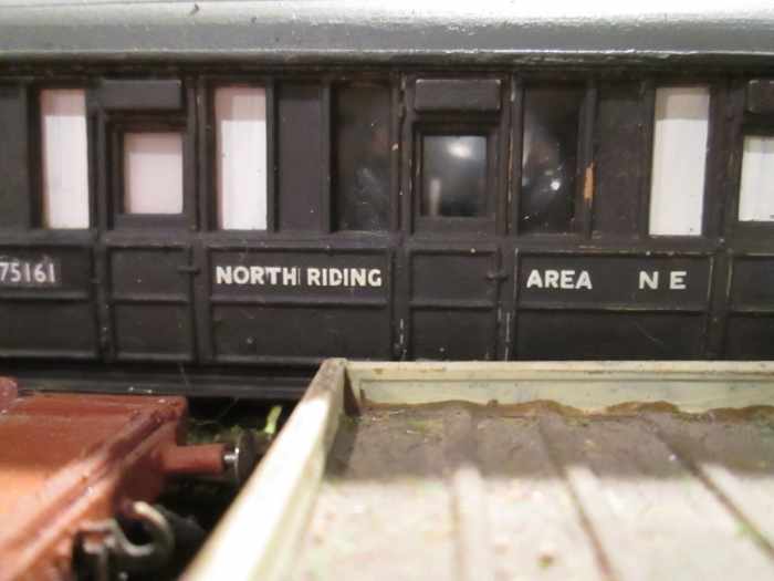 Detail: Close-up of the engineer's mess coach - re-working of an Ian Kirk quad-art body with Gresley bogies and short underframe trussing (taken across a condemned plate wagon)