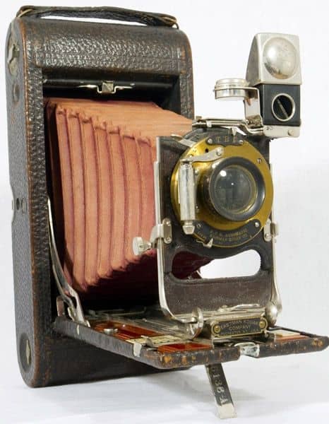 Aluminium construction with nickel fittings and covered in seal grain leather designed to be carried in a top coat pocket and manufactured from 1903 to 1915.