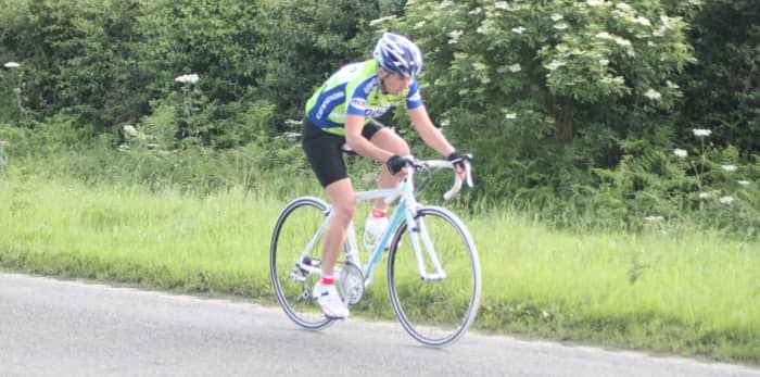 The muscles for cycling in action. A female cyclist on an Orbea road bike. The Soleus muscle of this rider is initiating the recovery phase of the pedal stroke.