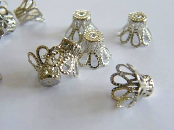 Small Bead Caps. Beautiful with lucite flower beads and the perfect spacers between crystals and flowers.