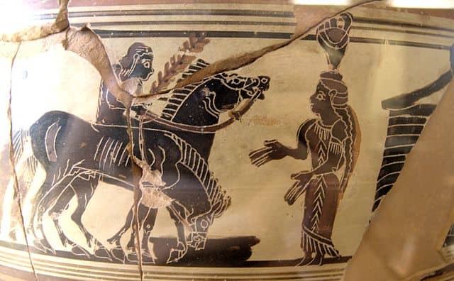 A Laconian 'dinos' mixing bowl from circa 560-540 BC depicting Achilles on horseback approaching Troilus and Polyxena. This piece is now on display at the Louvre.