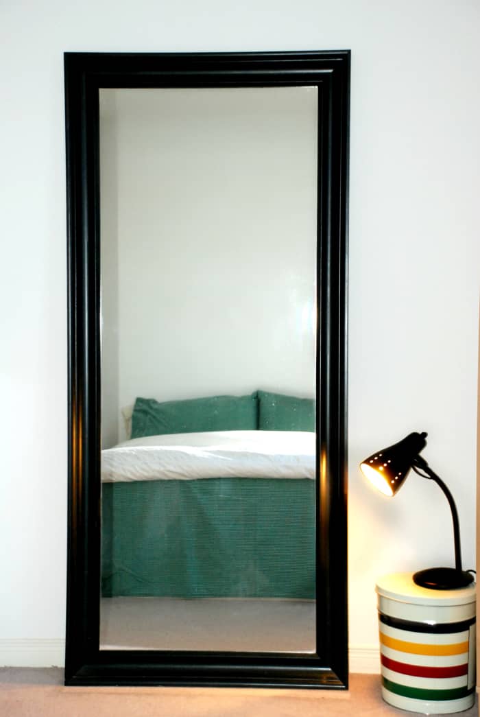 This huge tall mirror faces the foot of our bed. My part of the bed is in-line straight with the mirror. Is this mirror affecting my night's sleep?