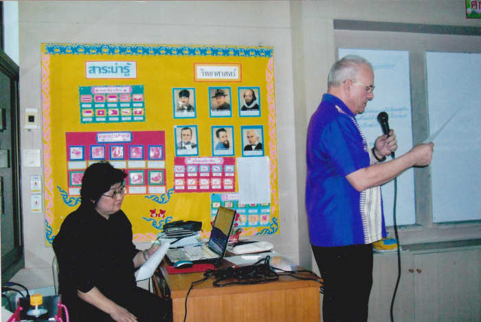 The author working with a Thai teacher at Saint Joseph Bangna School in Thailand in 2014.