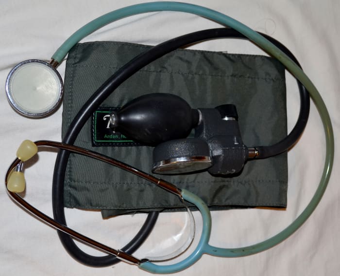 My sphygmomanometer, or blood pressure cuff and stethoscope. They have seen better days, but they are still in good working order.