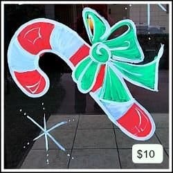 This candy cane sketch was brought to life on this storefront window. It's a good example of how to market and price your work.