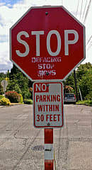 A visual tip of the hat to irony. While I DO NOT SUPPORT defacing stop signs, I must admit that this is one of the best visual representations of irony I have ever encountered.