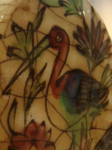 A 19th century Persian earthenware jar depicting a crane on display at the San Antonio Museum of Art in San Antonio, TX, USA.