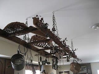 This is one of the greatest ideas for decorating with a ladder. Remember to make sure that you hit studs when you hang this or use anchors.