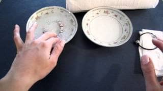 cleaning your Pandora Style charm bracelets and its charms - two bowls of water and a soft cloth