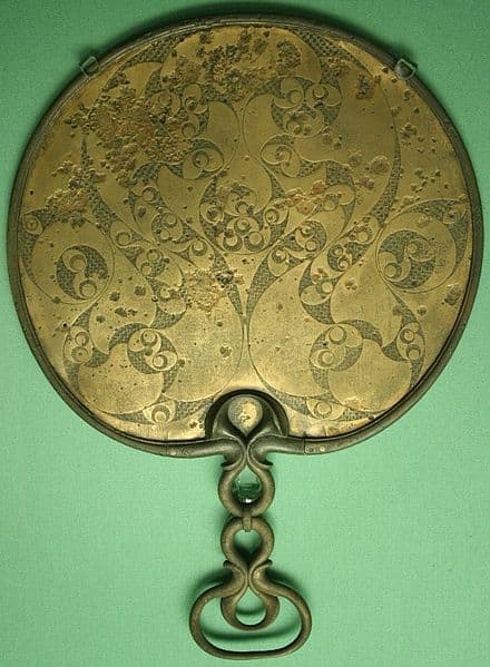 Beautiful bronze decorated backside of a mirror. An example of Celtic art in the Romano-Britain period. (England)