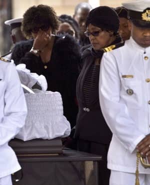 Winnie next to Mandela's Coffin lying in State in Pretoria. Madikizela-Mandela bids farewell to the former president lying in state at the Union Buildings in Pretoria