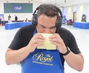 Andre Derrick judging cheese at Canada's largest and longest-running cheese competition, the Royal Winter Fair Cheese and Butter Competition in Toronto, Canada