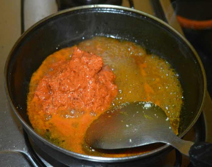 Step four: Add the ground paste and salt.