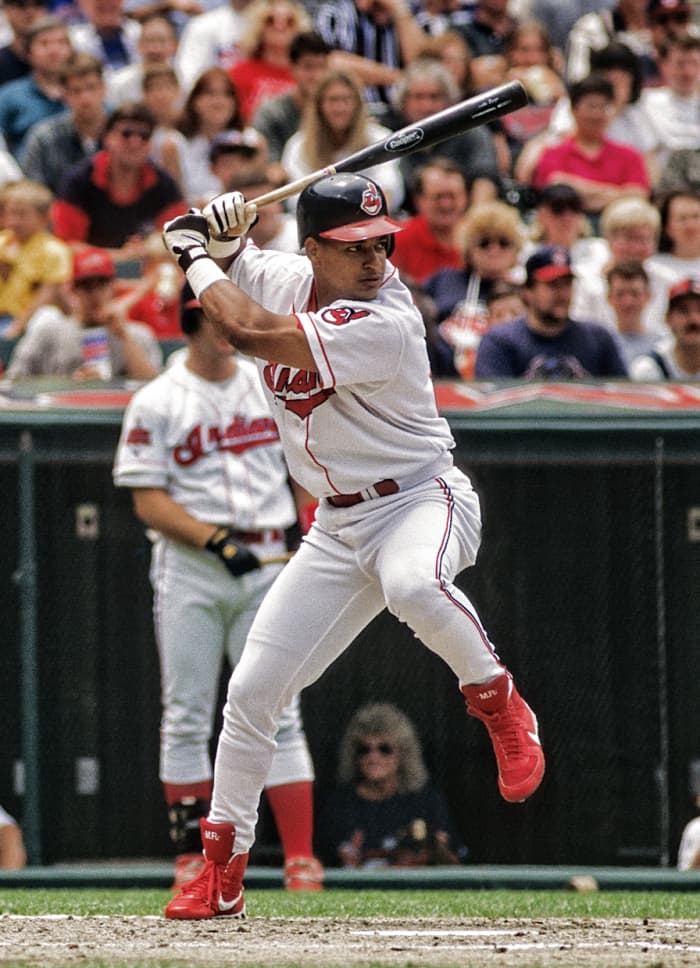 Manny Ramirez was one of several prominent sluggers for the Indians during the late 90s, as was Jim Thome (seen on-deck). Both players are among the 10 most feared power hitters in franchise history.