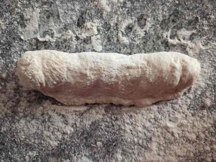 Fold over half again and pinch to seal.