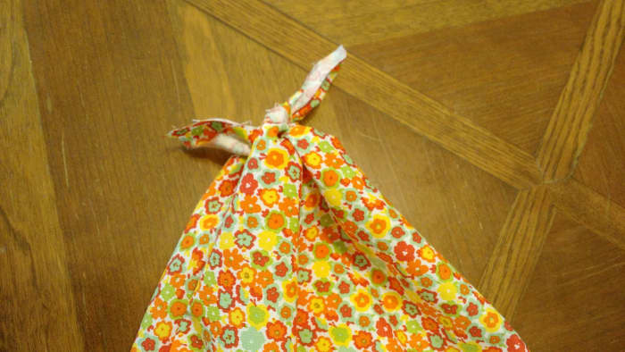 Option One for Finishing the Bag: Tie the two loose corners at the top in a knot and then tie one more knot.