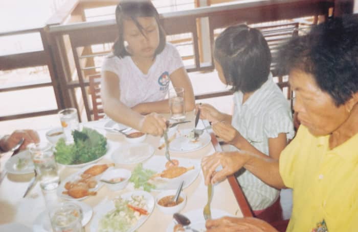 Author's two stepdaughters and mother-in-law dining at the Daeng NamNueng Restaurant. (Taken in 2004.)