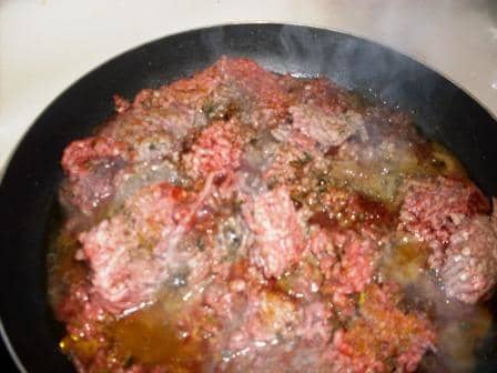 Recipe for how to make the best healthier beef lasagna. Cooking ground beef on the stove top for preparing delicious beef lasagna