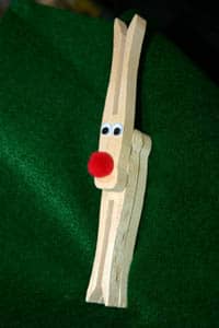 Example of the completed clothespin reindeer craft. If you like, you can paint the clothespin brown to make them look more like reindeer.