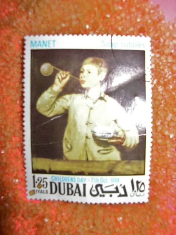 Would you allow me to present to you the classic children's day stamp of a child blowing soap bubbles on a bed of sugar?
