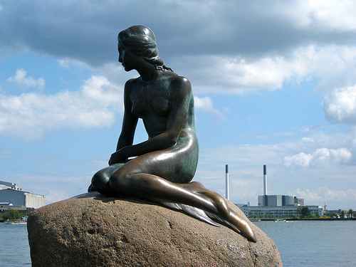 The statue of "The Little Mermaid," to commemorate the fairy tale of the same name written by Hans Christian Anderson. Statue sculpted by Edward Eriksen in 1913.