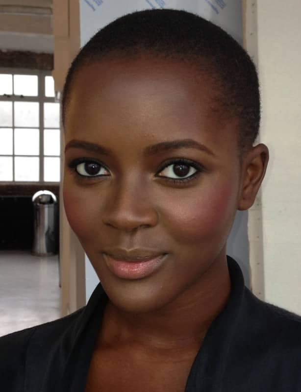 Her skin is too dark and her hair is too short. Hence, she could not be beautiful as far as my students are concerned. However, some of the girls did admire her big, clear eyes.