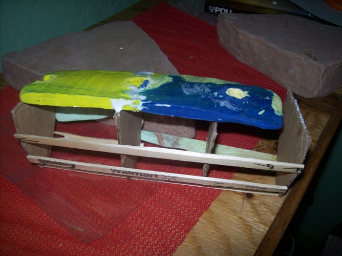 Baked-clay deck attached to hull. Two brands I have used are EberhardFaber FIMO and Bake Shop Oven-Bake Clay